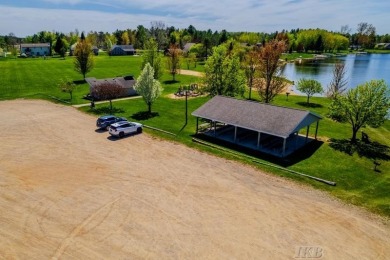 SUGAR SPRINGS! Get ready to enjoy this ultimate Up North getaway on Lakeside Golf Course in Michigan - for sale on GolfHomes.com, golf home, golf lot