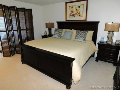 This ground-floor, 1-story, end unit enjoys easy access from the on Seasons Ridge At Four Seasons in Missouri - for sale on GolfHomes.com, golf home, golf lot