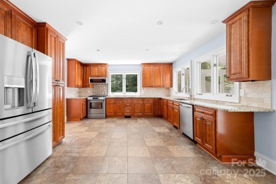 A spacious retreat nestled in the sought-after Shannon Acres on Statesville Country Club in North Carolina - for sale on GolfHomes.com, golf home, golf lot