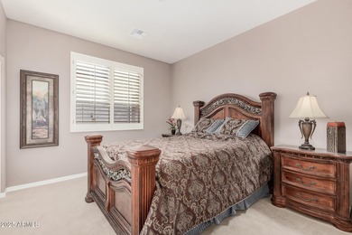Immaculate single-level home with a bright, open floor plan on The Golf Club At Johnson Ranch in Arizona - for sale on GolfHomes.com, golf home, golf lot
