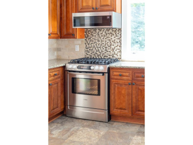 A spacious retreat nestled in the sought-after Shannon Acres on Statesville Country Club in North Carolina - for sale on GolfHomes.com, golf home, golf lot