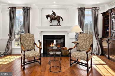 Set behind a private automated gate on nearly 3 acres, this on Golf Club At South River in Maryland - for sale on GolfHomes.com, golf home, golf lot