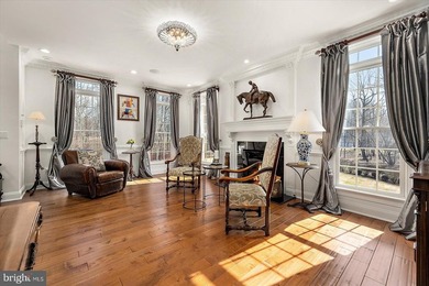 Set behind a private automated gate on nearly 3 acres, this on Golf Club At South River in Maryland - for sale on GolfHomes.com, golf home, golf lot