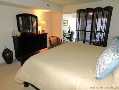 This ground-floor, 1-story, end unit enjoys easy access from the on Seasons Ridge At Four Seasons in Missouri - for sale on GolfHomes.com, golf home, golf lot