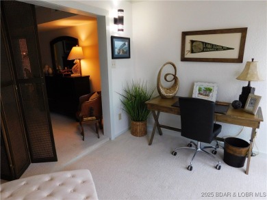 This ground-floor, 1-story, end unit enjoys easy access from the on Seasons Ridge At Four Seasons in Missouri - for sale on GolfHomes.com, golf home, golf lot