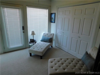 This ground-floor, 1-story, end unit enjoys easy access from the on Seasons Ridge At Four Seasons in Missouri - for sale on GolfHomes.com, golf home, golf lot