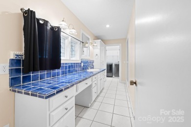 A spacious retreat nestled in the sought-after Shannon Acres on Statesville Country Club in North Carolina - for sale on GolfHomes.com, golf home, golf lot