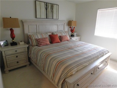 This ground-floor, 1-story, end unit enjoys easy access from the on Seasons Ridge At Four Seasons in Missouri - for sale on GolfHomes.com, golf home, golf lot