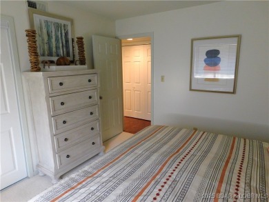 This ground-floor, 1-story, end unit enjoys easy access from the on Seasons Ridge At Four Seasons in Missouri - for sale on GolfHomes.com, golf home, golf lot