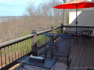 This ground-floor, 1-story, end unit enjoys easy access from the on Seasons Ridge At Four Seasons in Missouri - for sale on GolfHomes.com, golf home, golf lot