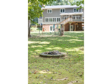 A spacious retreat nestled in the sought-after Shannon Acres on Statesville Country Club in North Carolina - for sale on GolfHomes.com, golf home, golf lot