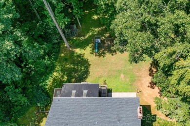 A spacious retreat nestled in the sought-after Shannon Acres on Statesville Country Club in North Carolina - for sale on GolfHomes.com, golf home, golf lot