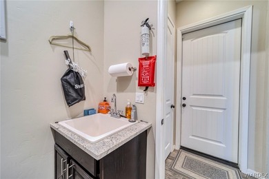 Introducing 405 Greenway Drive in Kingman, Arizona - a on Cerbat Cliffs Golf Course in Arizona - for sale on GolfHomes.com, golf home, golf lot