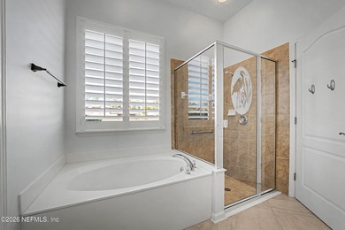 Water views - Sunset views - Eagle Harbor amenities - Primary on Golf Club At Fleming Island in Florida - for sale on GolfHomes.com, golf home, golf lot