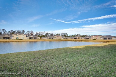 Water views - Sunset views - Eagle Harbor amenities - Primary on Golf Club At Fleming Island in Florida - for sale on GolfHomes.com, golf home, golf lot