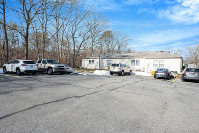 Welcome home to comfort, convenience and care-free living. A on Leisure Village Golf Course in New York - for sale on GolfHomes.com, golf home, golf lot