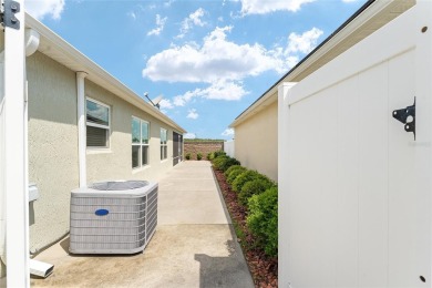One or more photo(s) has been virtually staged. ~2016 ROOF, HVAC on The Links of Spruce Creek in Florida - for sale on GolfHomes.com, golf home, golf lot