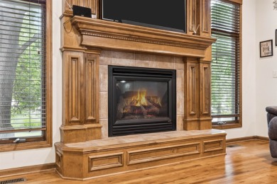 This beautifully updated Reflection Ridge ranch offers an ideal on Reflection Ridge Golf Club in Kansas - for sale on GolfHomes.com, golf home, golf lot