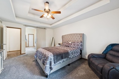 This beautifully updated Reflection Ridge ranch offers an ideal on Reflection Ridge Golf Club in Kansas - for sale on GolfHomes.com, golf home, golf lot