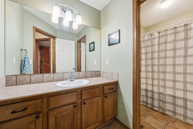 This beautifully updated Reflection Ridge ranch offers an ideal on Reflection Ridge Golf Club in Kansas - for sale on GolfHomes.com, golf home, golf lot