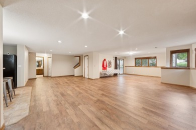 This beautifully updated Reflection Ridge ranch offers an ideal on Reflection Ridge Golf Club in Kansas - for sale on GolfHomes.com, golf home, golf lot