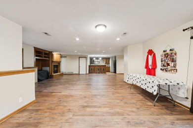 This beautifully updated Reflection Ridge ranch offers an ideal on Reflection Ridge Golf Club in Kansas - for sale on GolfHomes.com, golf home, golf lot
