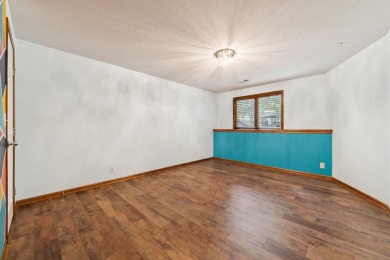 This beautifully updated Reflection Ridge ranch offers an ideal on Reflection Ridge Golf Club in Kansas - for sale on GolfHomes.com, golf home, golf lot
