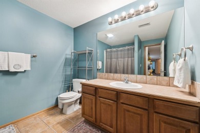 This beautifully updated Reflection Ridge ranch offers an ideal on Reflection Ridge Golf Club in Kansas - for sale on GolfHomes.com, golf home, golf lot