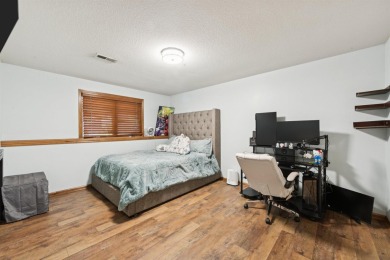 This beautifully updated Reflection Ridge ranch offers an ideal on Reflection Ridge Golf Club in Kansas - for sale on GolfHomes.com, golf home, golf lot