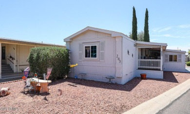 This charming 2-bedroom, 2-bath home is located in the highly on Paradise Peak Golf Course in Arizona - for sale on GolfHomes.com, golf home, golf lot