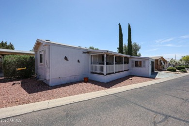 This charming 2-bedroom, 2-bath home is located in the highly on Paradise Peak Golf Course in Arizona - for sale on GolfHomes.com, golf home, golf lot