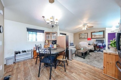 This charming 2-bedroom, 2-bath home is located in the highly on Paradise Peak Golf Course in Arizona - for sale on GolfHomes.com, golf home, golf lot