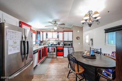 This charming 2-bedroom, 2-bath home is located in the highly on Paradise Peak Golf Course in Arizona - for sale on GolfHomes.com, golf home, golf lot