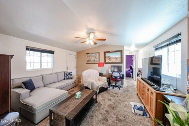 This charming 2-bedroom, 2-bath home is located in the highly on Paradise Peak Golf Course in Arizona - for sale on GolfHomes.com, golf home, golf lot
