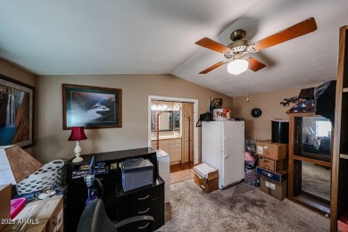 This charming 2-bedroom, 2-bath home is located in the highly on Paradise Peak Golf Course in Arizona - for sale on GolfHomes.com, golf home, golf lot