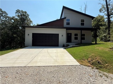 Be the first to own this beautifully designed modern home on the on  in Arkansas - for sale on GolfHomes.com, golf home, golf lot