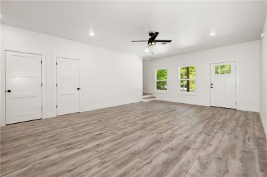 Be the first to own this beautifully designed modern home on the on  in Arkansas - for sale on GolfHomes.com, golf home, golf lot