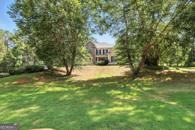 Welcome to your dream home! Nestled on a generous 1.16-acre lot on Overlook Golf Links in Georgia - for sale on GolfHomes.com, golf home, golf lot
