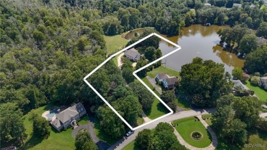 WATERFRONT PROPERTY. This exceptional colonial-style residence on Fort Lee Cardinal Golf Course in Virginia - for sale on GolfHomes.com, golf home, golf lot