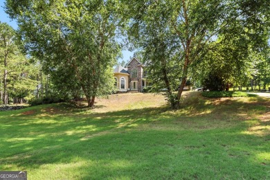 Welcome to your dream home! Nestled on a generous 1.16-acre lot on Overlook Golf Links in Georgia - for sale on GolfHomes.com, golf home, golf lot