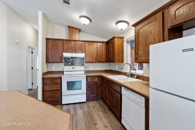 Nicely upgraded Prepper-Focused home offered in this 55+ active on Prescott Golf and Country Club in Arizona - for sale on GolfHomes.com, golf home, golf lot