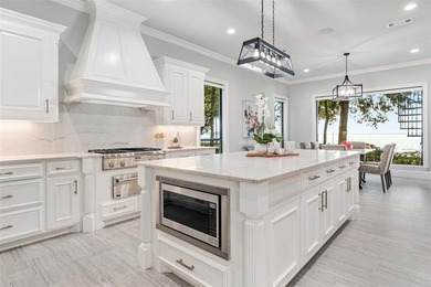 Welcome home to a beautifully revived waterfront estate in gated on Pinnacle Golf and Boat Club in Texas - for sale on GolfHomes.com, golf home, golf lot