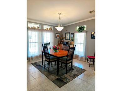 THIS ONE IS A MUST SEE IN ITS PRICE BRACKET. MANY RECENT on Southport Springs Golf Club in Florida - for sale on GolfHomes.com, golf home, golf lot