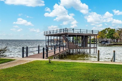 Welcome home to a beautifully revived waterfront estate in gated on Pinnacle Golf and Boat Club in Texas - for sale on GolfHomes.com, golf home, golf lot