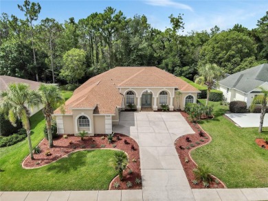 Discover luxurious living at 5348 Legend Hills Ln, nestled in on Silverthorn Country Club in Florida - for sale on GolfHomes.com, golf home, golf lot