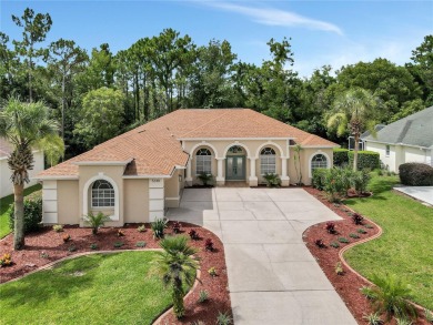 Discover luxurious living at 5348 Legend Hills Ln, nestled in on Silverthorn Country Club in Florida - for sale on GolfHomes.com, golf home, golf lot