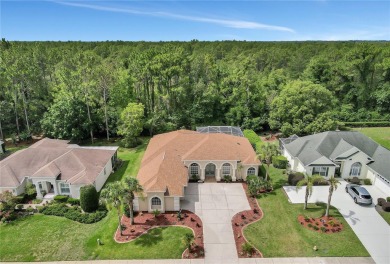 Discover luxurious living at 5348 Legend Hills Ln, nestled in on Silverthorn Country Club in Florida - for sale on GolfHomes.com, golf home, golf lot