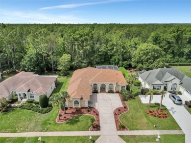 Discover luxurious living at 5348 Legend Hills Ln, nestled in on Silverthorn Country Club in Florida - for sale on GolfHomes.com, golf home, golf lot