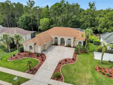 Discover luxurious living at 5348 Legend Hills Ln, nestled in on Silverthorn Country Club in Florida - for sale on GolfHomes.com, golf home, golf lot