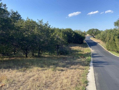 Don't miss out on this pretty wooded lot in Horseshoe Bay West on Apple Rock Golf Course - Horseshoe Bay in Texas - for sale on GolfHomes.com, golf home, golf lot